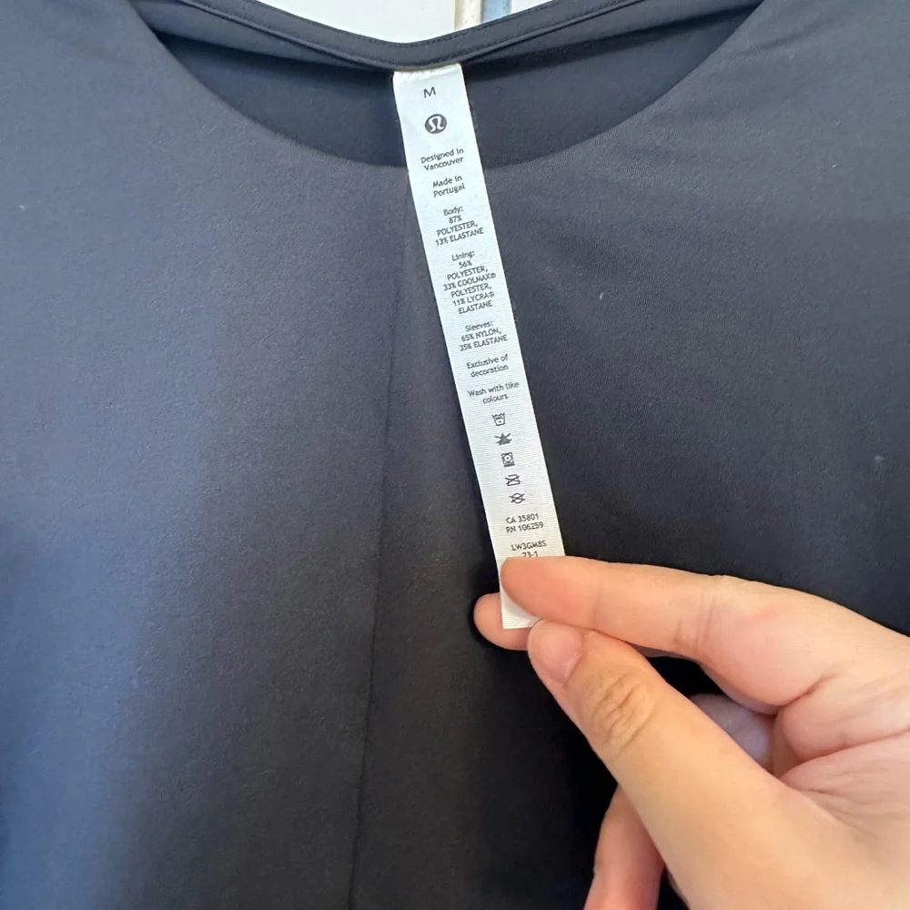EUC lululemon athletica Black Fitted Crop Long Sleeve Top - Picture 2 of 5